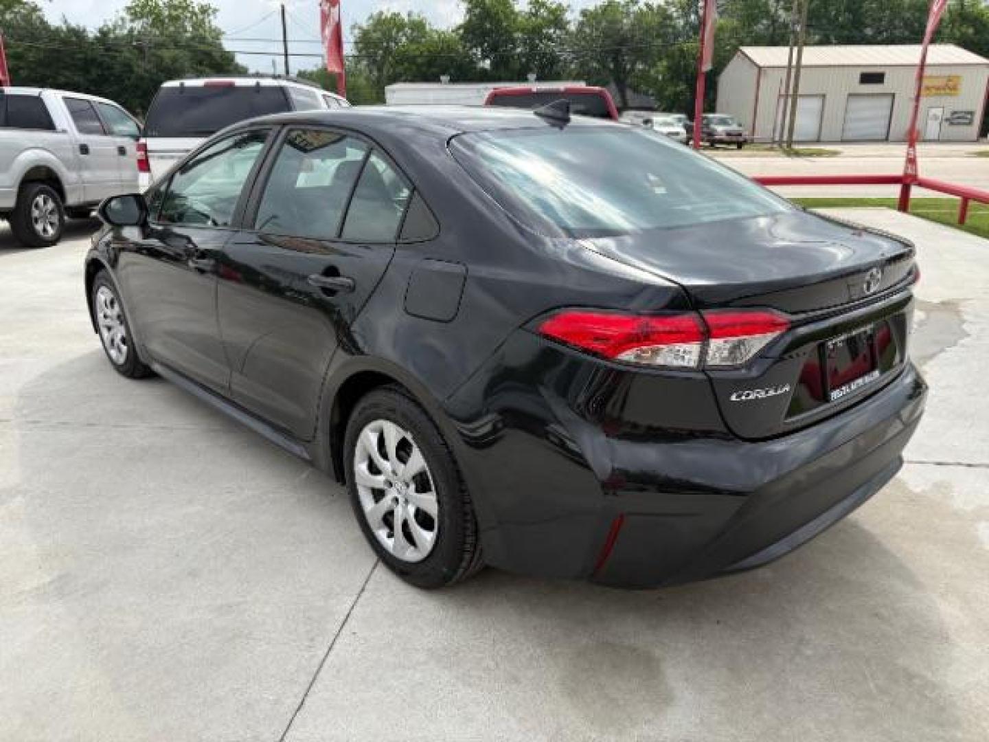 2022 Black Sand Pearl /Black Toyota Corolla LE (5YFEPMAE5NP) with an 1.8L I-4 DOHC engine, located at 900 South McDonald Street, McKinney, TX, 75069, (972) 529-2992, 33.189335, -96.613403 - Photo#2