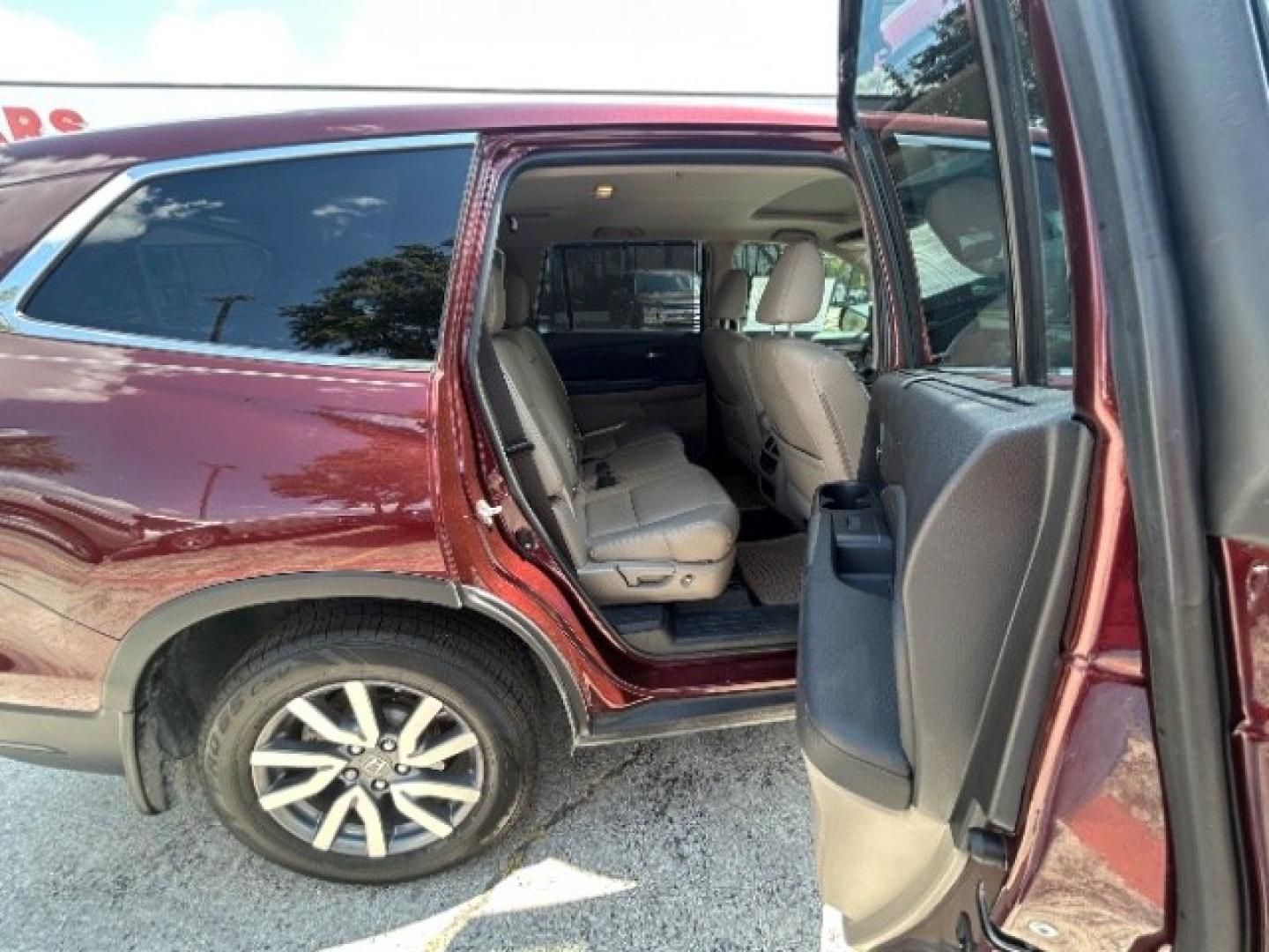 2019 Burgundy /Beige Honda Pilot EX-L (5FNYF5H57KB) with an 3.5L V-6 direct injection engine, Automatic transmission, located at 900 South McDonald Street, McKinney, TX, 75069, (972) 529-2992, 33.189335, -96.613403- Photo#10